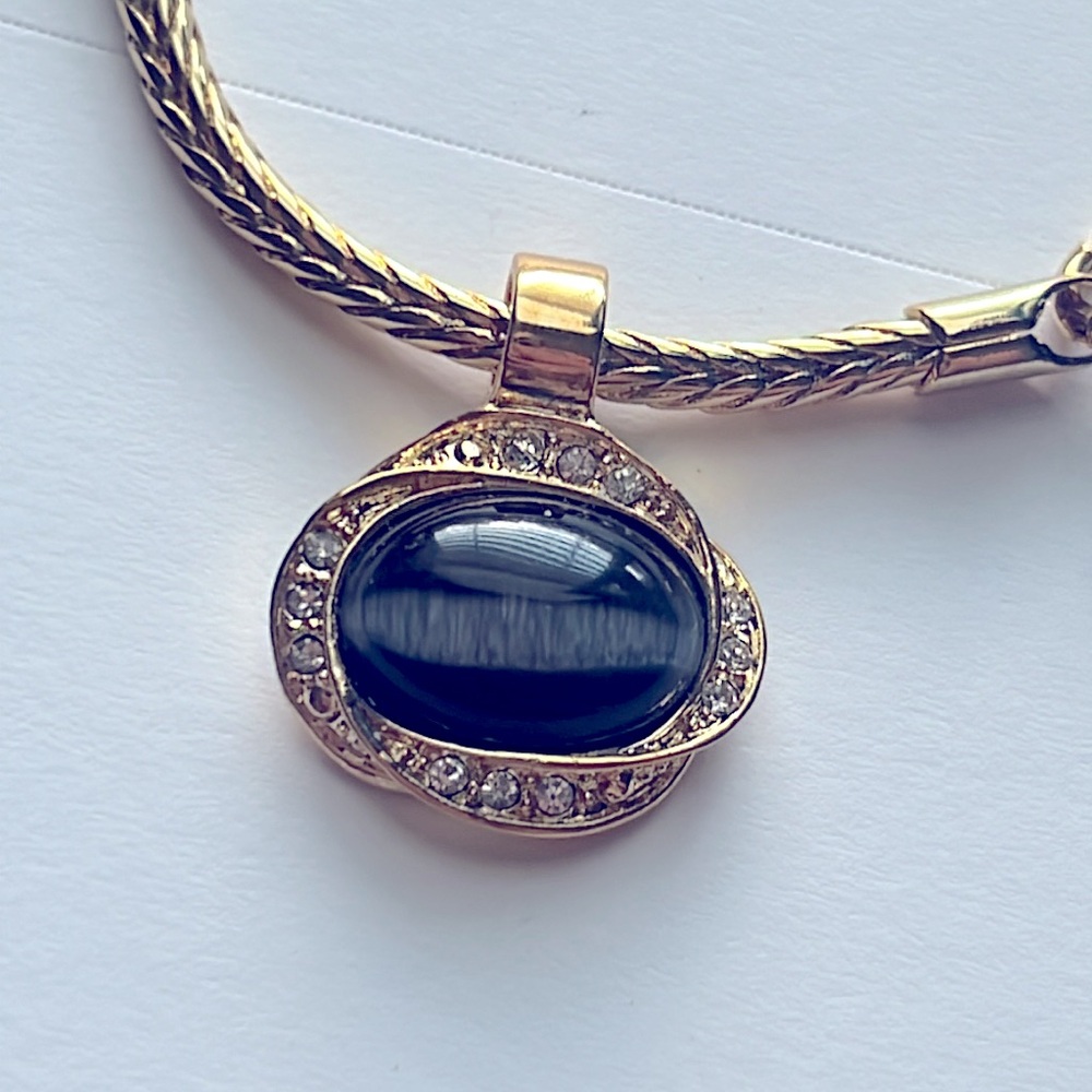 Gold pendant gray cats eye with rhinestone on gold chain